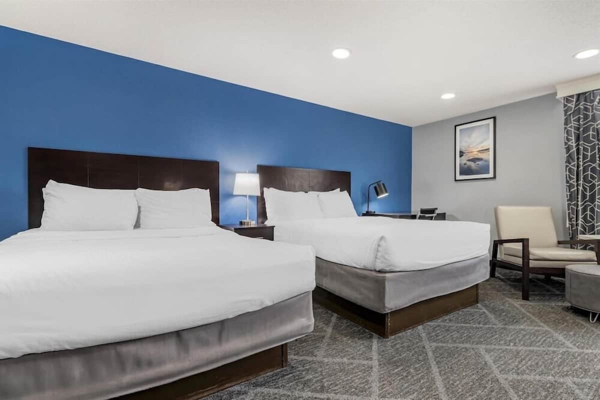 Blackout drapes, soundproofing, iron/ironing board, rollaway beds