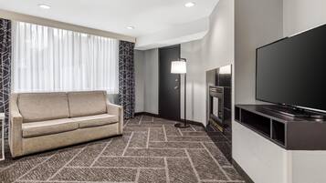 Executive Room, 1 King Bed, Non Smoking, Fireplace (Shower Only;with Single Sofabed) | Blackout drapes, soundproofing, iron/ironing board, rollaway beds