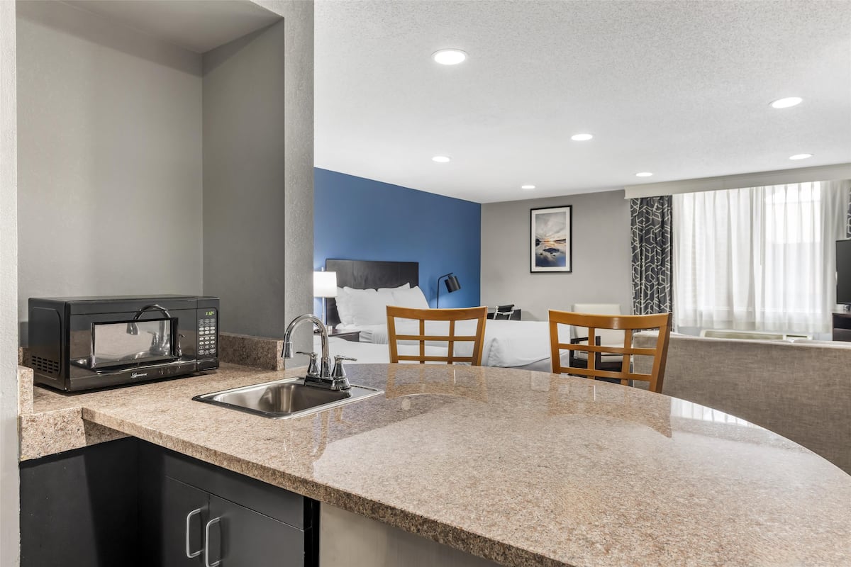 executive room, 2 queen beds, non smoking, refrigerator & microwave (living room) | 1 bedroom, blackout curtains, soundproofing, iron/ironing board