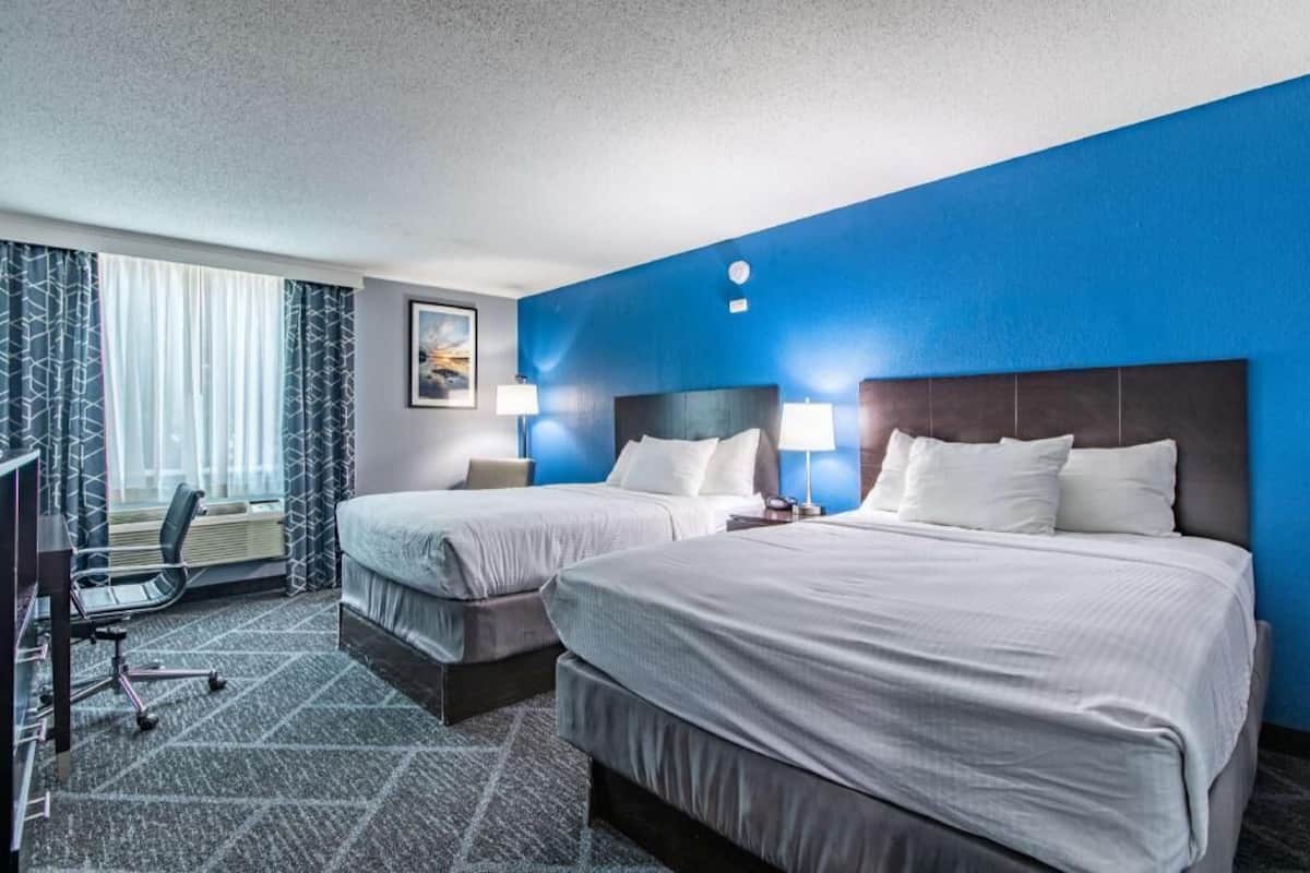 Blackout drapes, soundproofing, iron/ironing board, rollaway beds