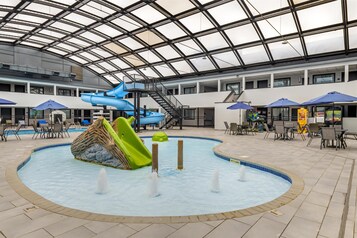 Indoor pool, open 9:00 AM to 10:00 PM, pool umbrellas, pool loungers