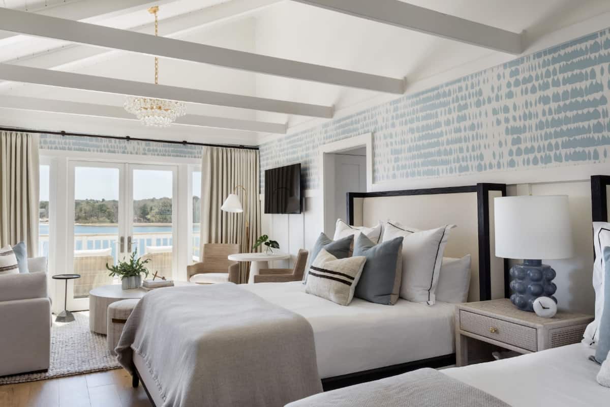 hydrangea water view two queen | frette italian sheets, premium bedding, down duvets, minibar