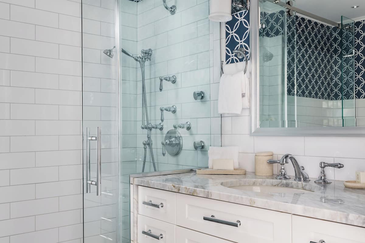 Designer toiletries, hair dryer, bathrobes, slippers
