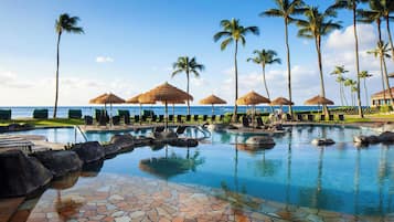 2 outdoor pools, open 8:00 AM to 9:00 PM, pool umbrellas, pool loungers