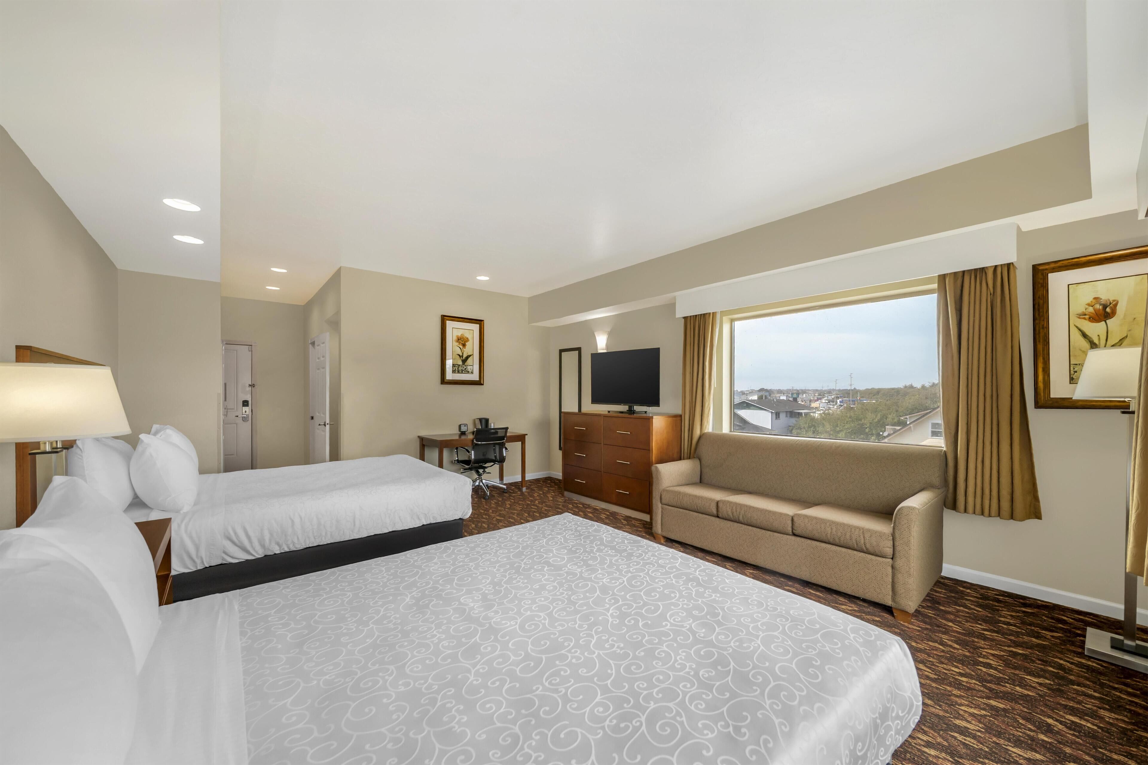 Standard Room, 2 Queen Beds, Non Smoking, City View | In-room safe, individually decorated, desk, laptop workspace