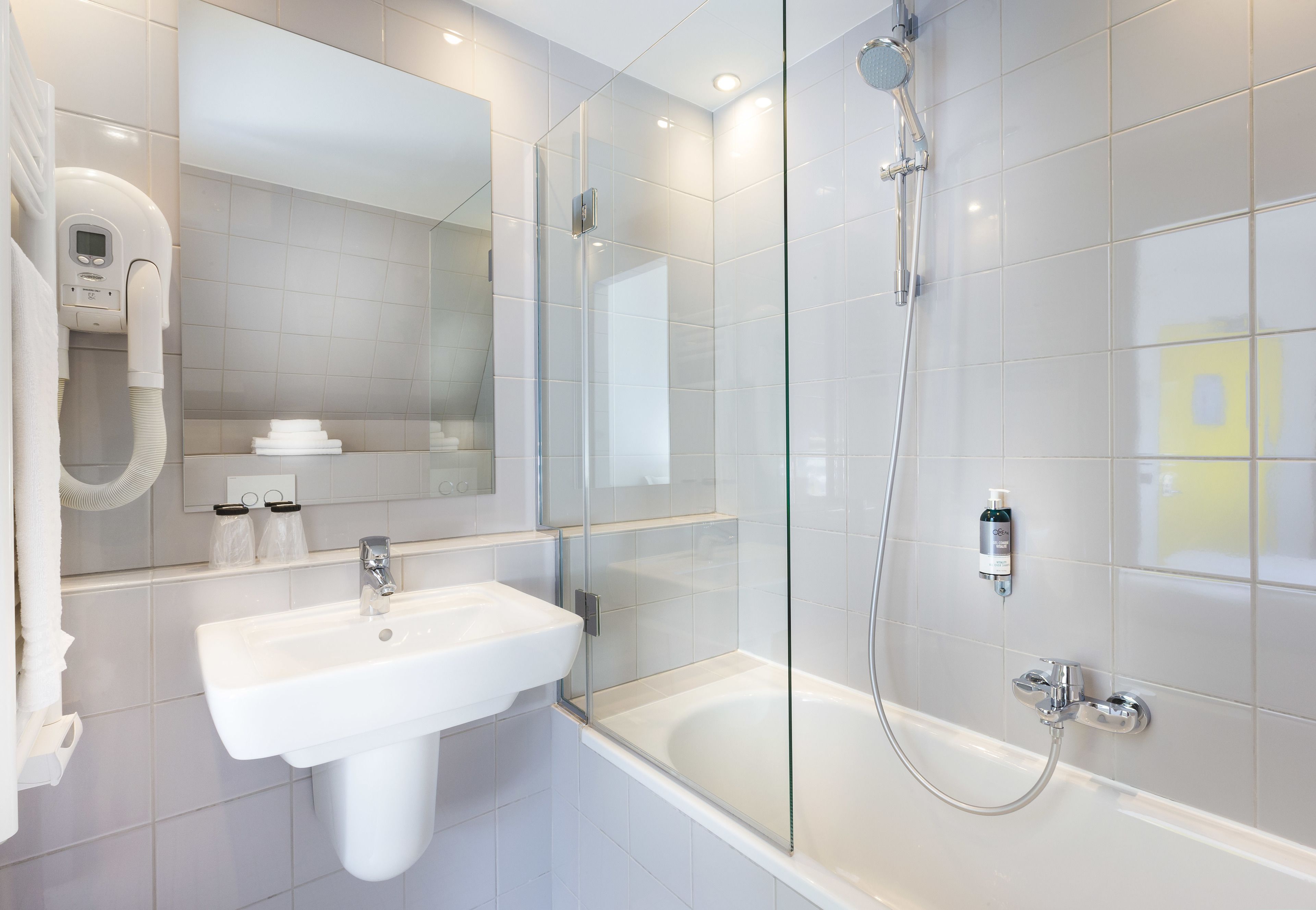 superior double room | bathroom | shower, hair dryer, towels