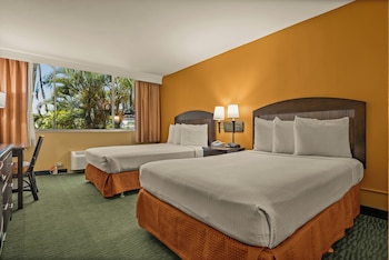 Room, 2 Double Beds | Premium bedding, desk, iron/ironing board, free cribs/infant beds at Airport Honolulu Hotel