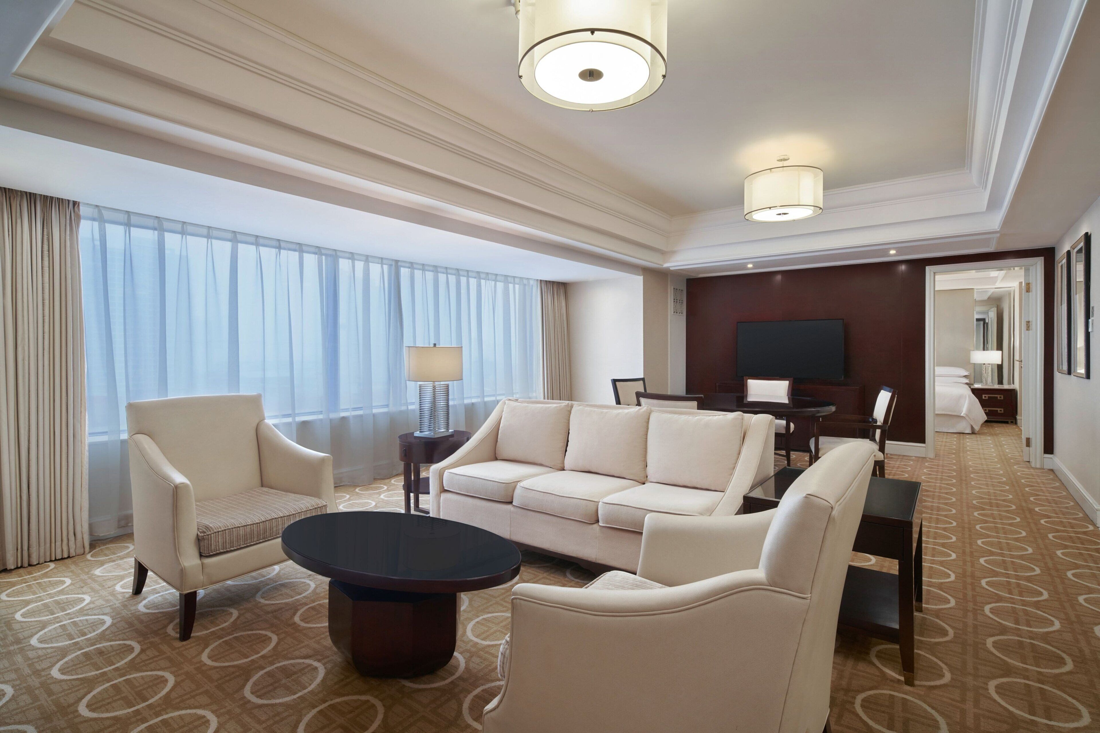 executive suite, 1 king bed | living room | 48-inch tv with satellite channels, ipod dock