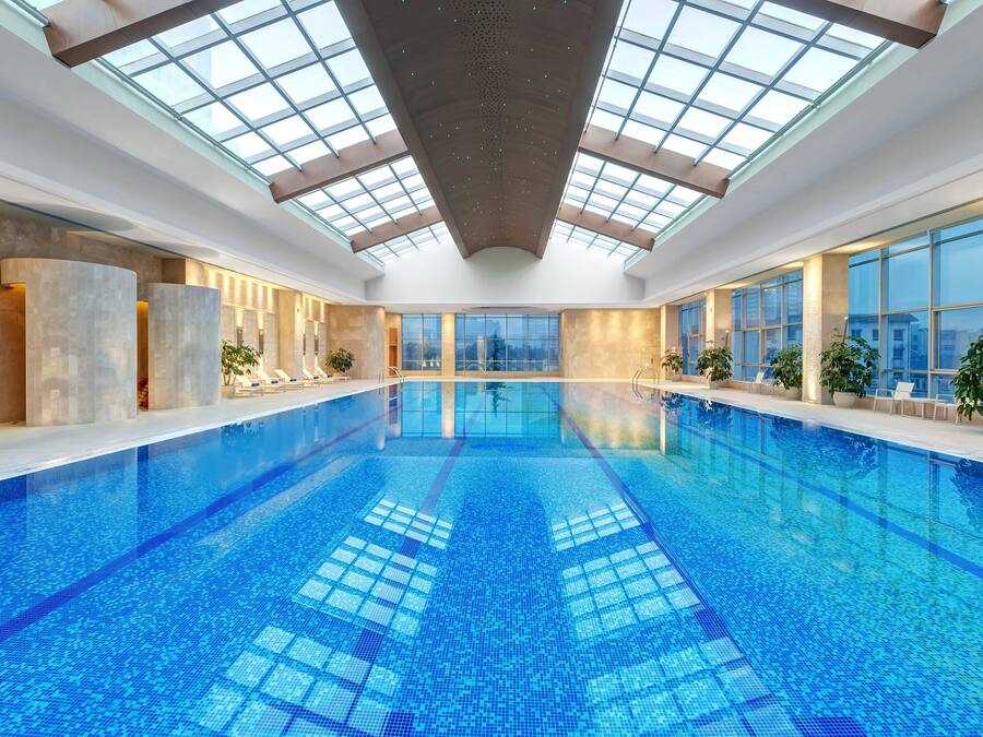 Indoor pool, open 7:00 AM to 10:00 PM, sun loungers