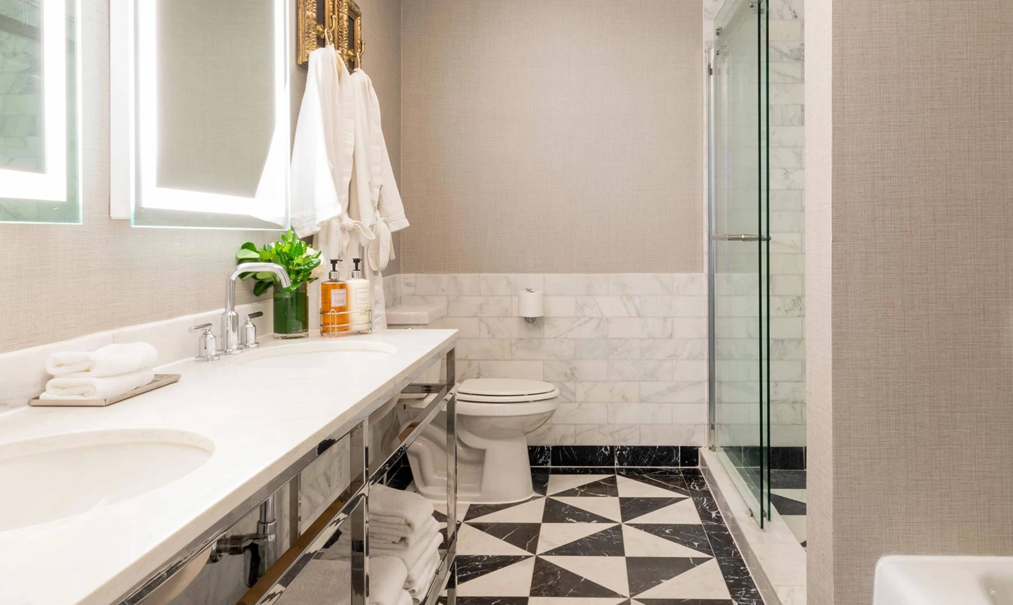 signature suite, 1 king bed, balcony (top floor) | bathroom | designer toiletries, hair dryer, bathrobes, towels