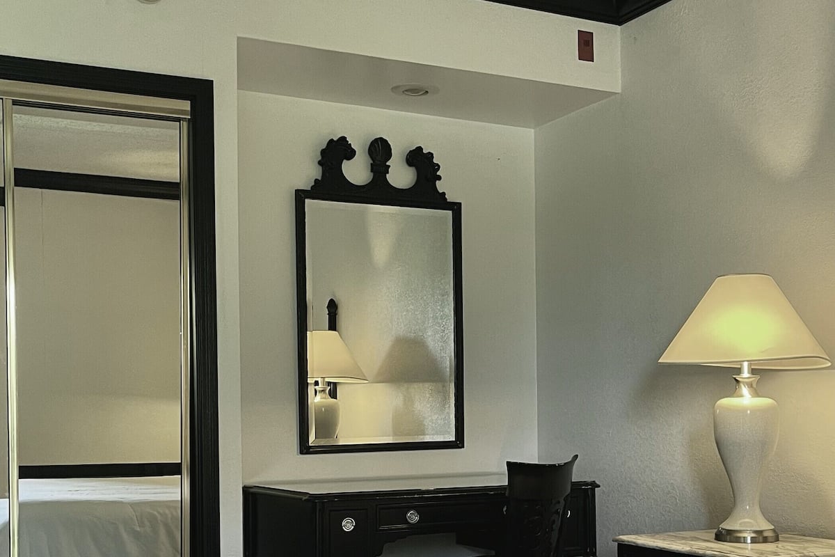 Individually furnished, desk, laptop workspace, blackout drapes