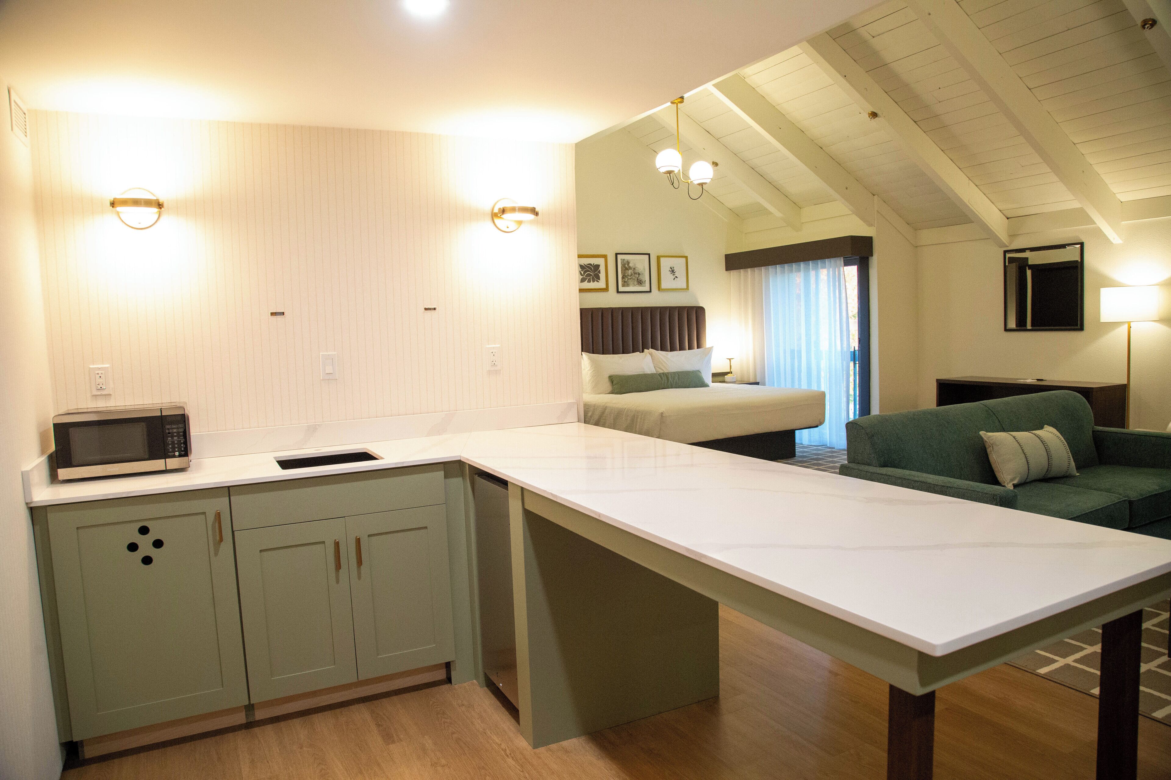 Desk, laptop workspace, blackout curtains, iron/ironing board