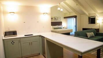 Desk, laptop workspace, blackout curtains, iron/ironing board