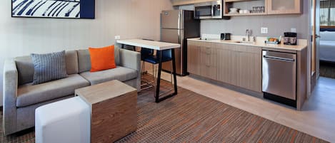 Full-sized fridge, microwave, stovetop, dishwasher