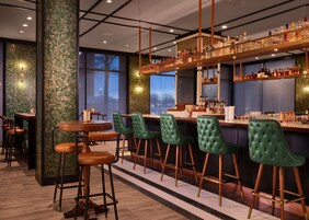 3 bars/lounges, lobby lounge, rooftop bar