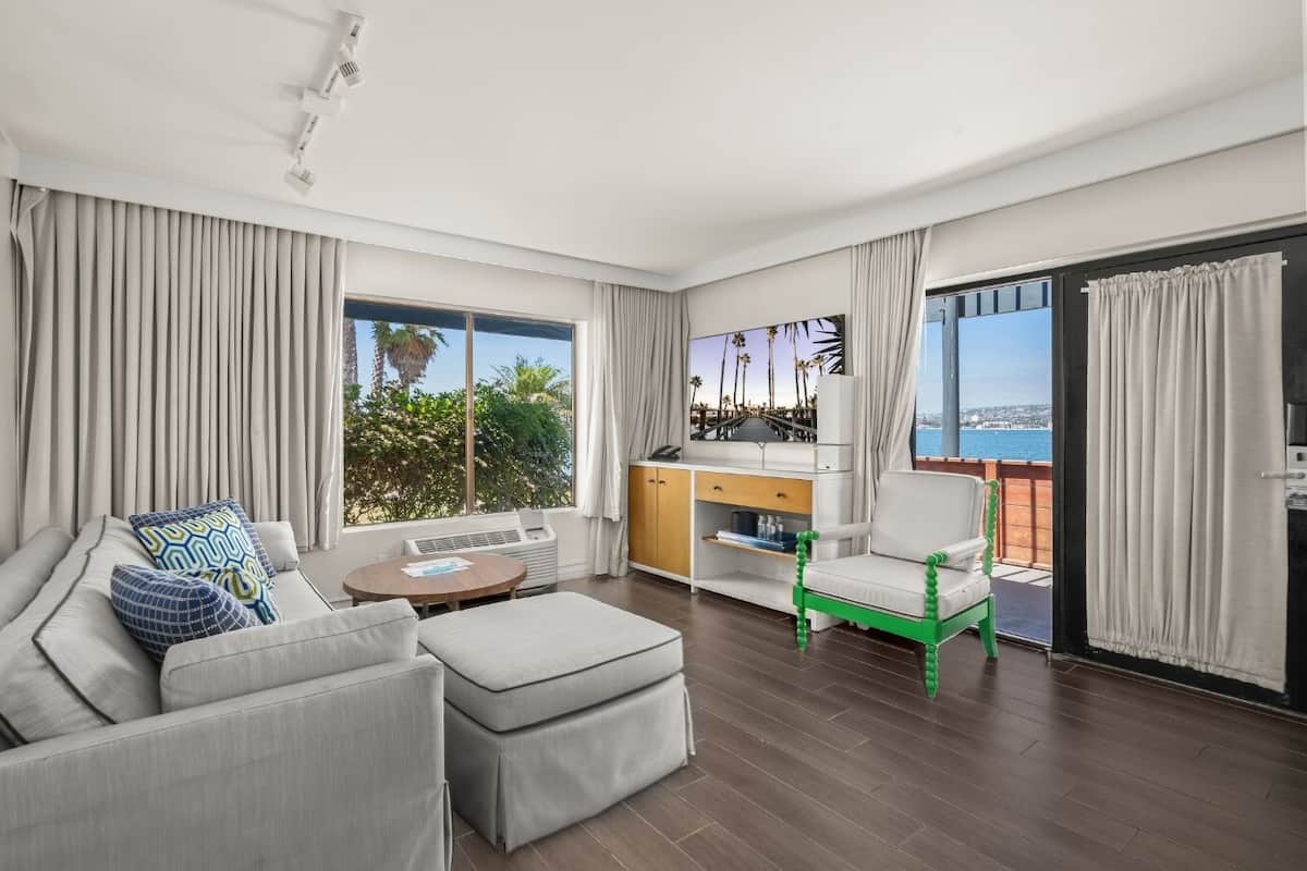 Suite, 1 King Bed (Bayside Bungalow Bay) | Living area | 60-inch LCD TV with cable channels, TV, table tennis