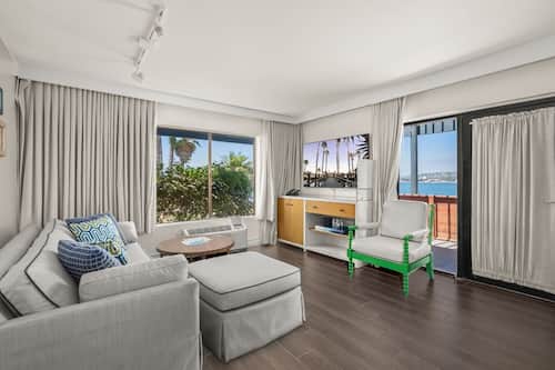 Suite, 1 King Bed (Bayside Bungalow Bay) | Living area | 60-inch LCD TV with cable channels, TV, table tennis