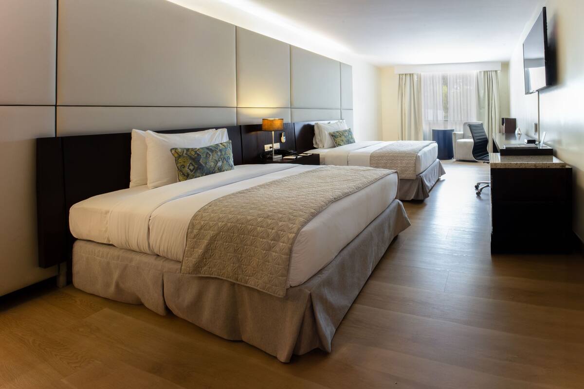 deluxe twin room | premium bedding, down duvets, in-room safe, desk