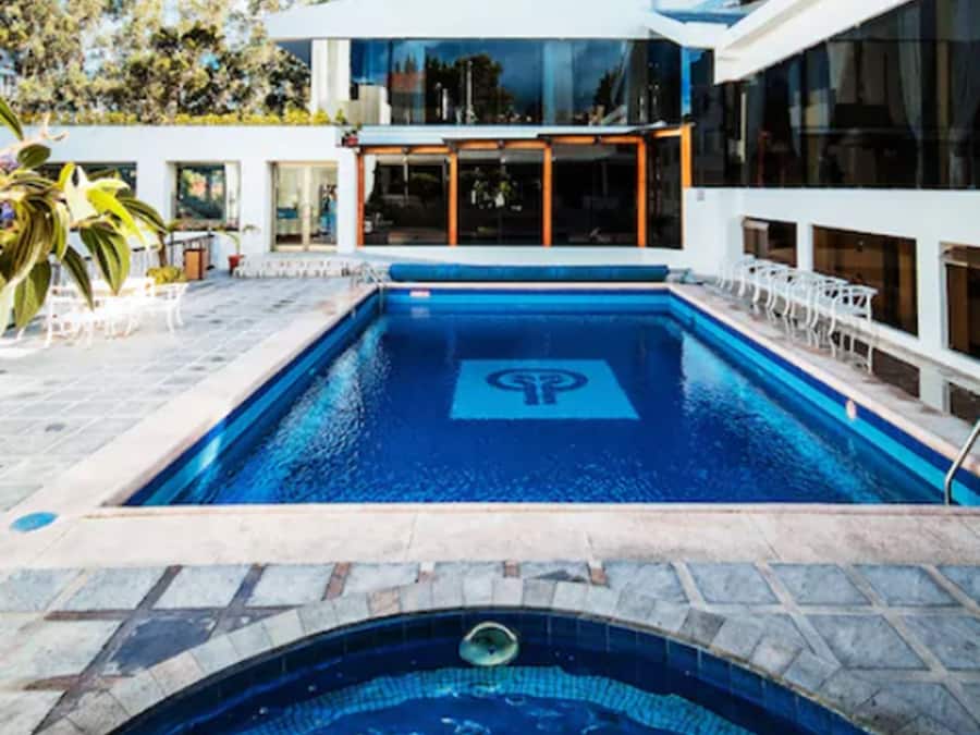 Outdoor pool, pool umbrellas, pool loungers