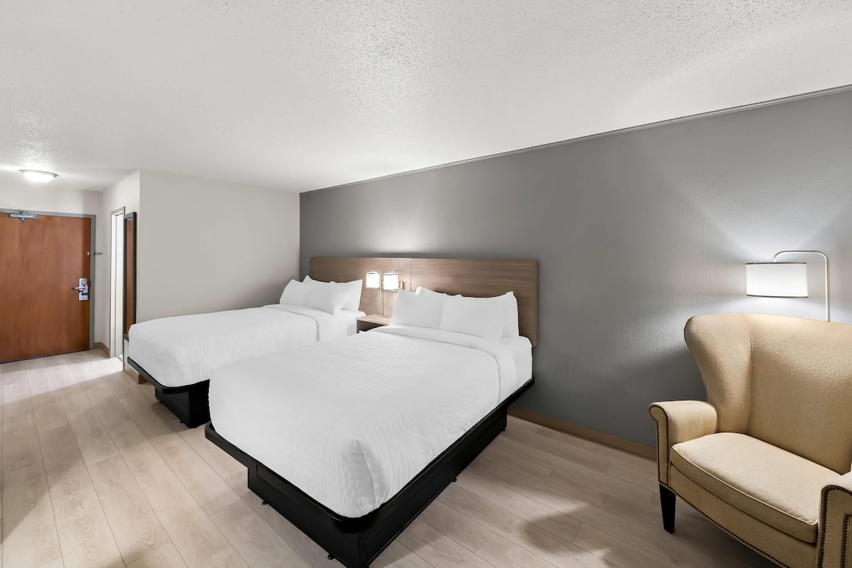 Desk, laptop workspace, free WiFi, bed sheets