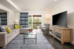 Hypo-allergenic bedding, down duvets, pillow-top beds, in-room safe