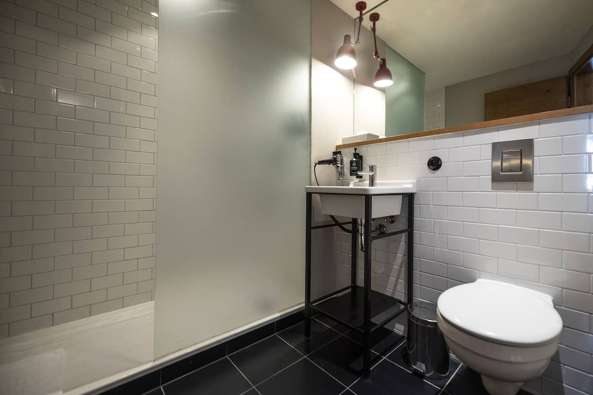 shower, rainfall showerhead, designer toiletries, hair dryer