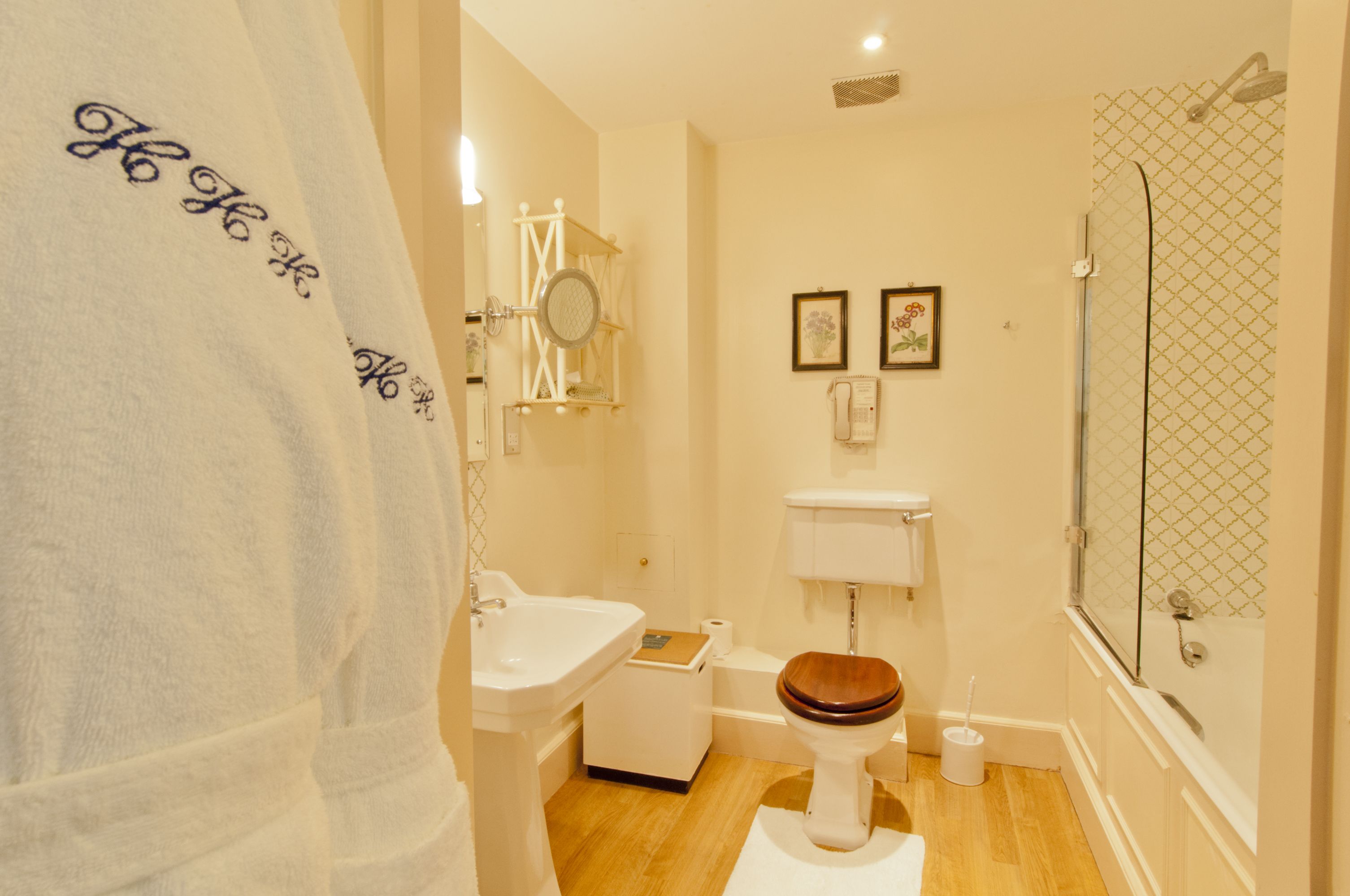 combined shower/bathtub, free toiletries, hair dryer, bathrobes