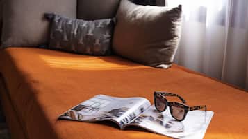 Superior Room (1 Queen Bed and 2 Single Sofa Beds) | Premium bedding, in-room safe, desk, laptop workspace