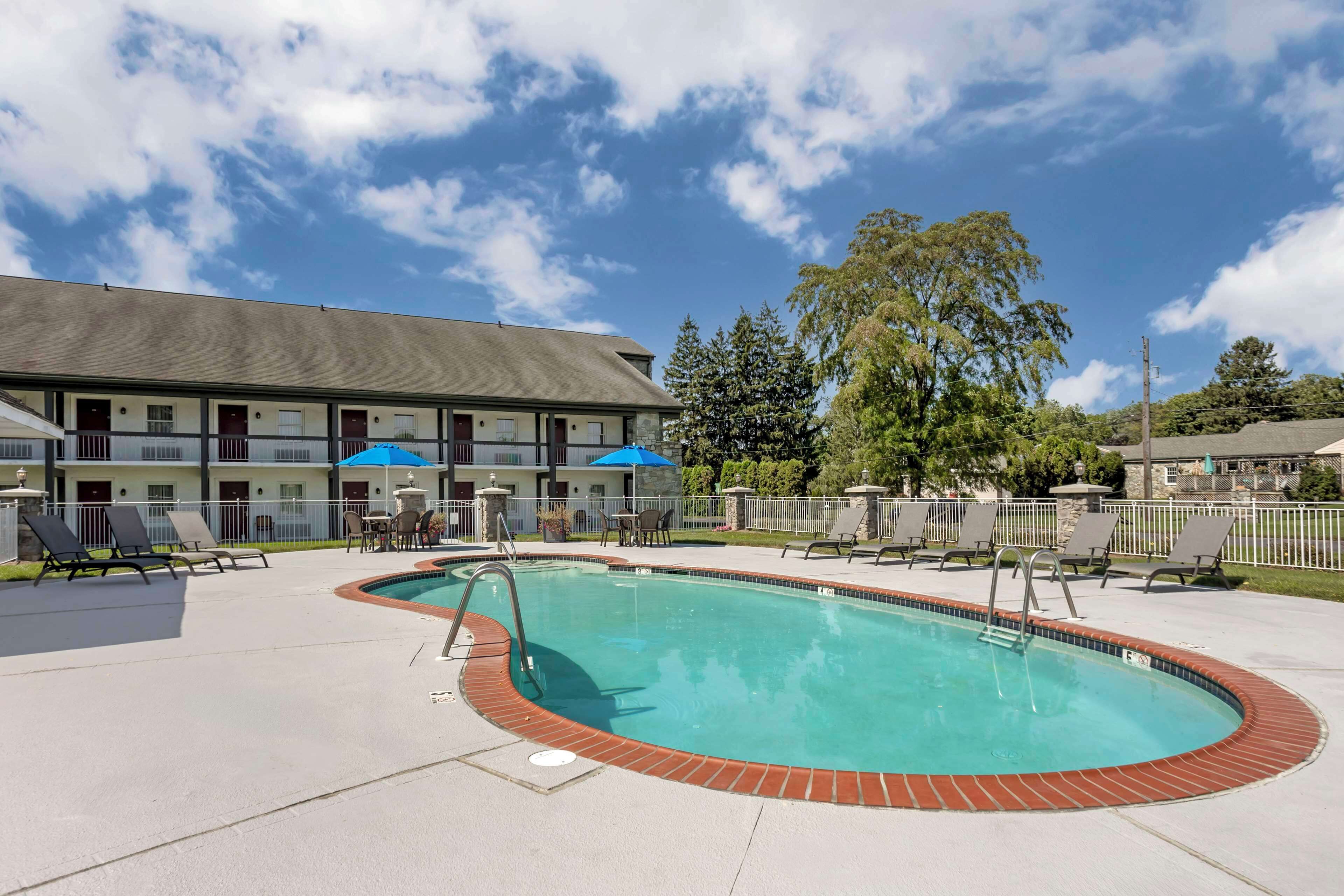 indoor pool, seasonal outdoor pool, pool umbrellas, pool loungers