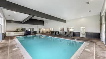 Indoor pool, seasonal outdoor pool, pool umbrellas, pool loungers