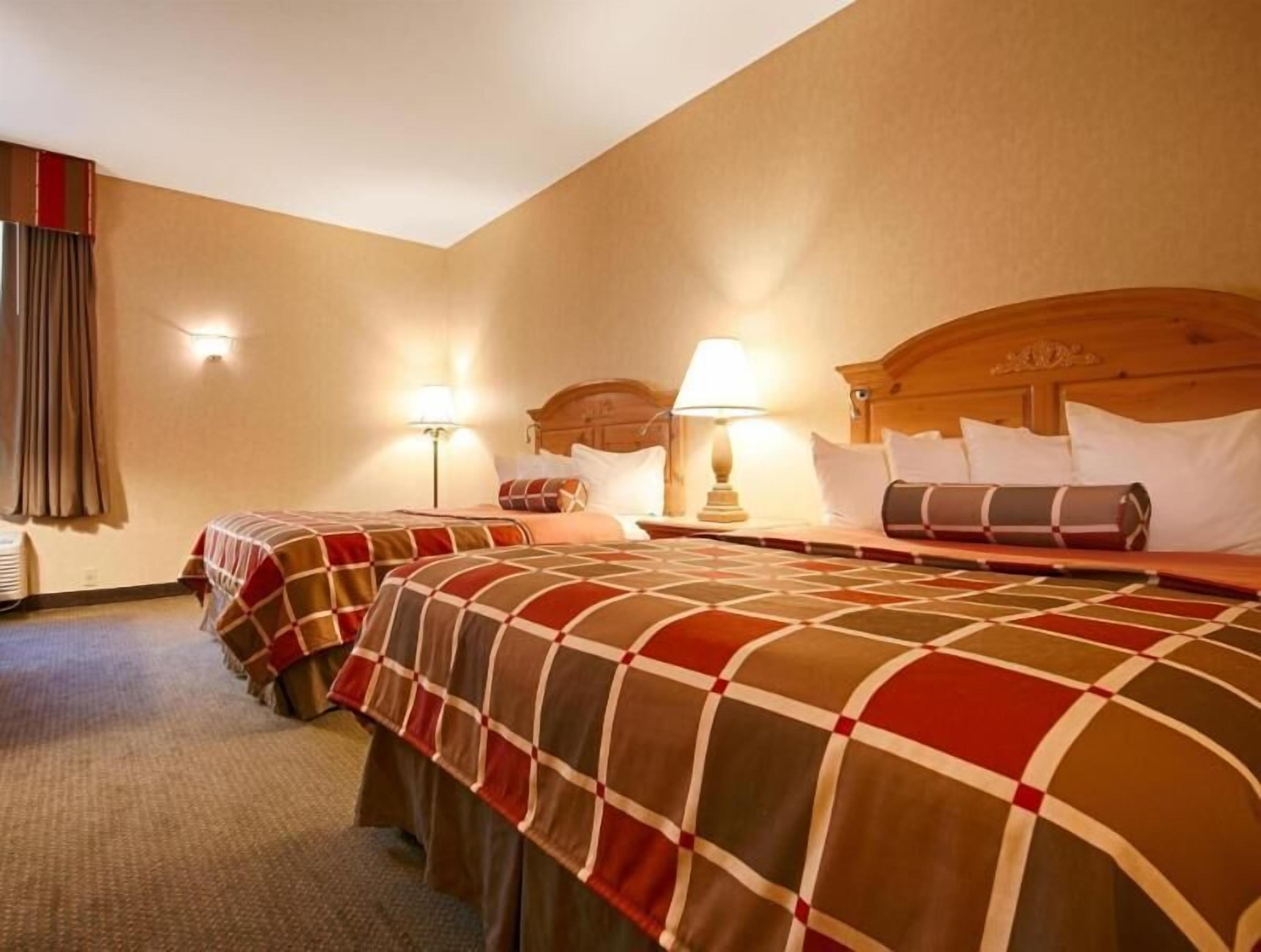 In-room safe, blackout curtains, iron/ironing board, cots/infant beds