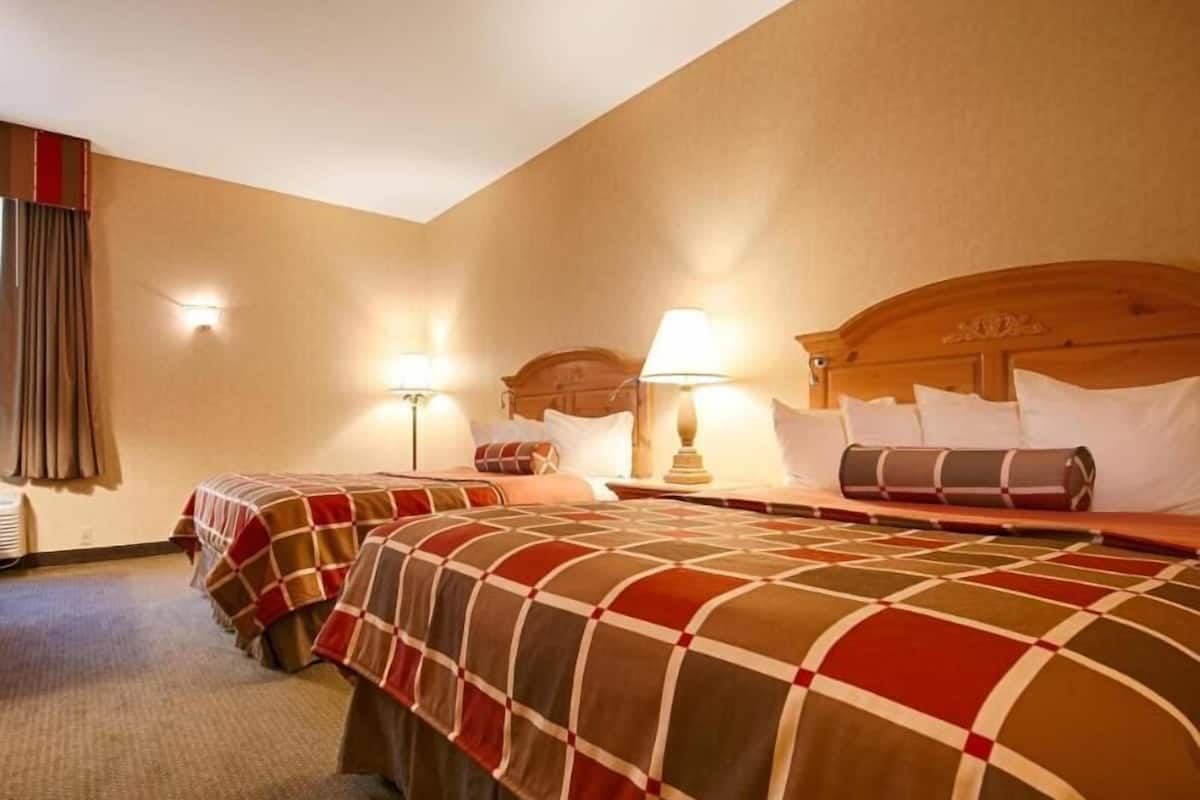 In-room safe, blackout curtains, iron/ironing board, cots/infant beds