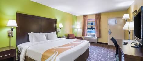 Desk, laptop workspace, blackout drapes, iron/ironing board