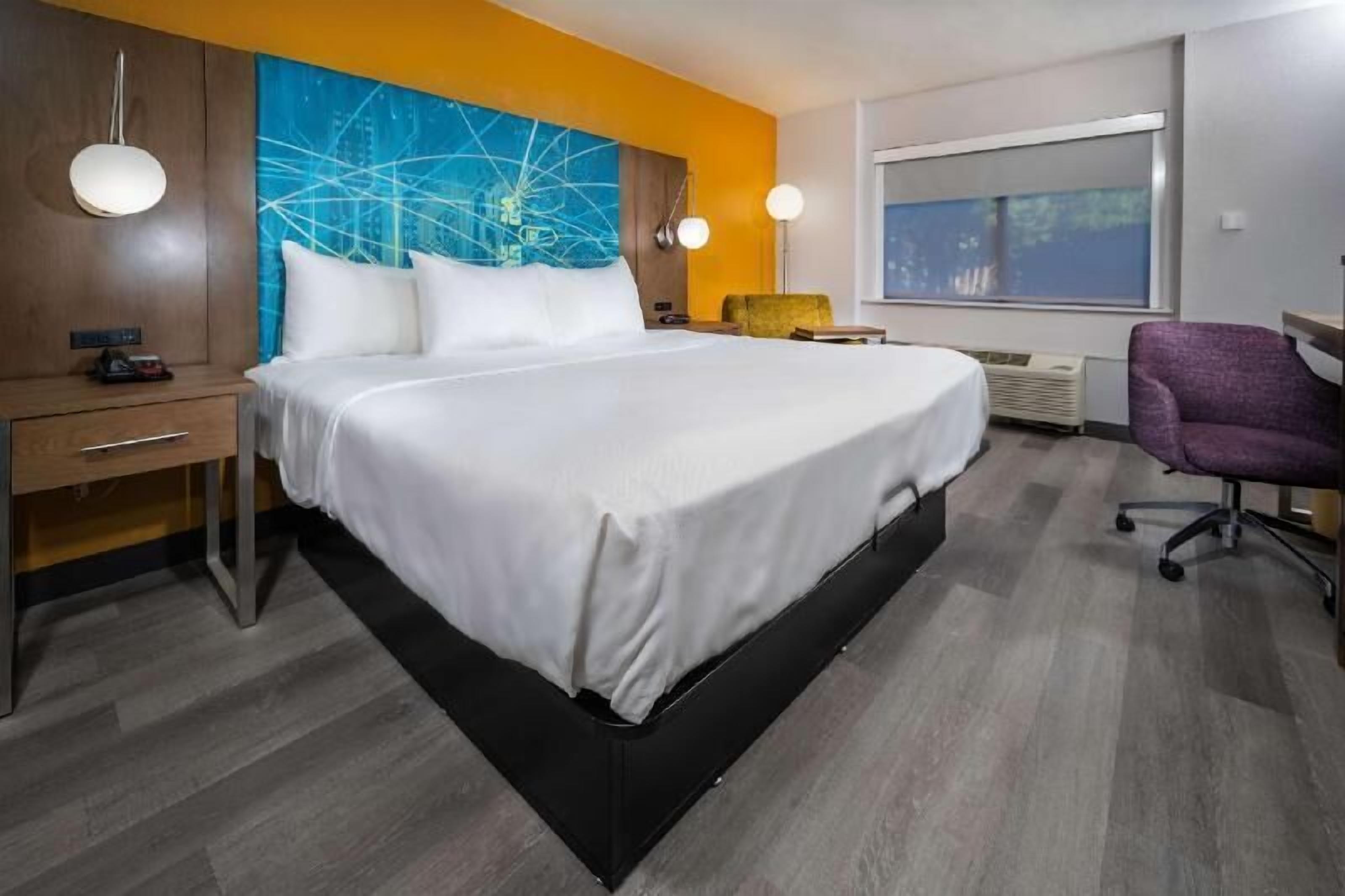 Premium bedding, pillowtop beds, desk, laptop workspace