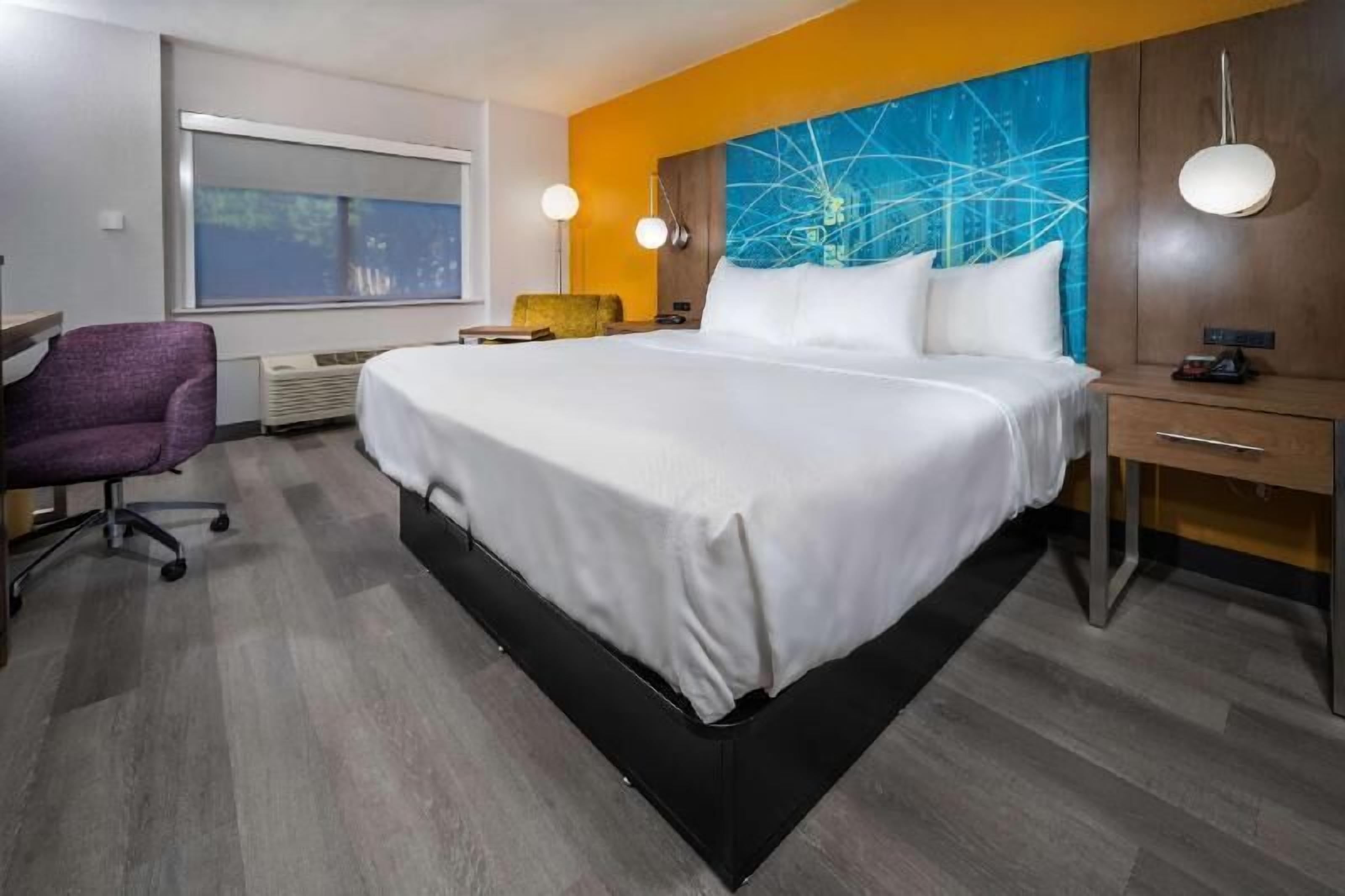 Premium bedding, pillowtop beds, desk, laptop workspace