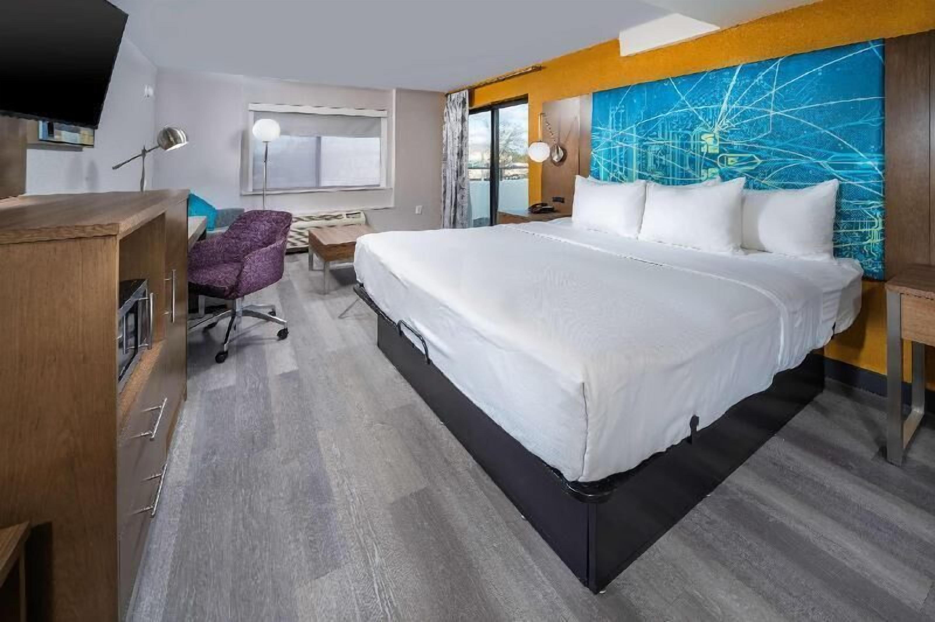 Premium bedding, pillowtop beds, desk, laptop workspace