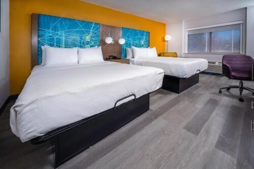 Premium bedding, pillowtop beds, desk, laptop workspace