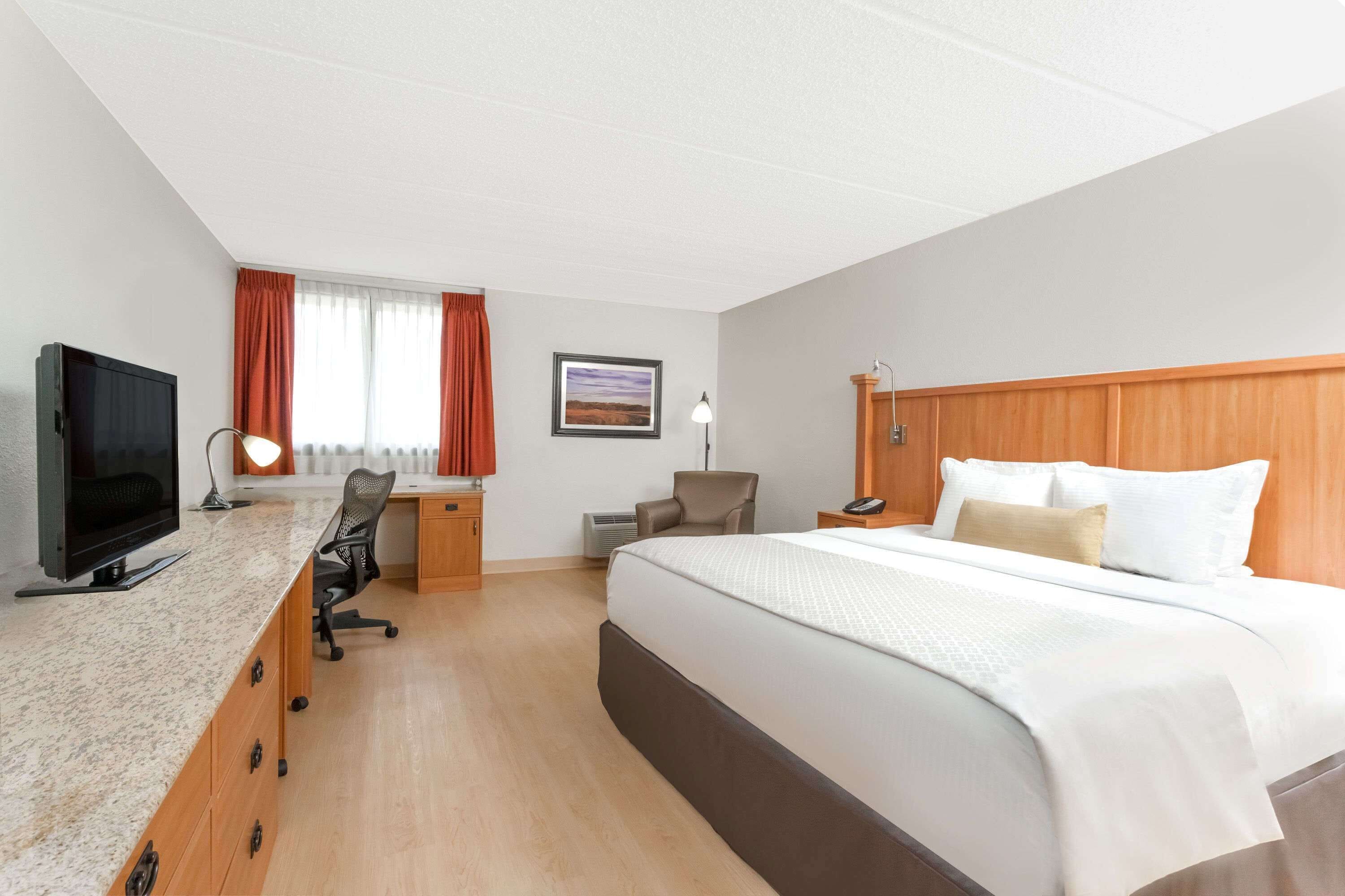 Hypo-allergenic bedding, pillow-top beds, in-room safe, desk