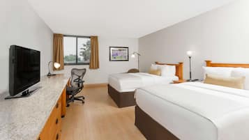 Hypo-allergenic bedding, pillowtop beds, in-room safe, desk
