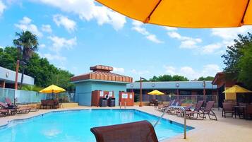 Outdoor pool, open 9:00 AM to 11:00 PM, pool umbrellas, sun loungers