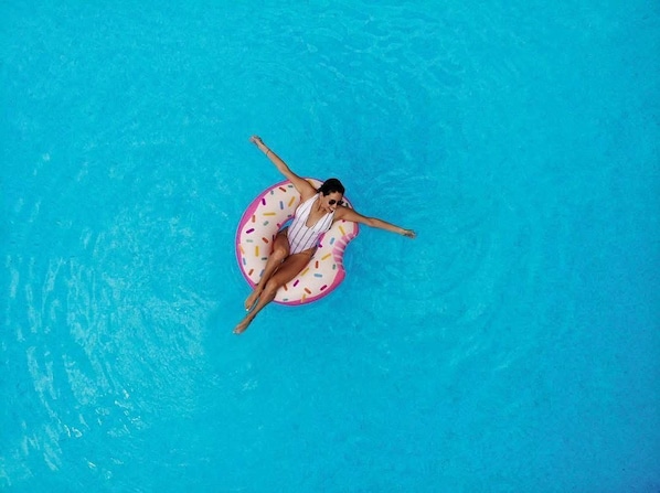 Outdoor pool, open 9:00 AM to 11:00 PM, pool umbrellas, sun loungers