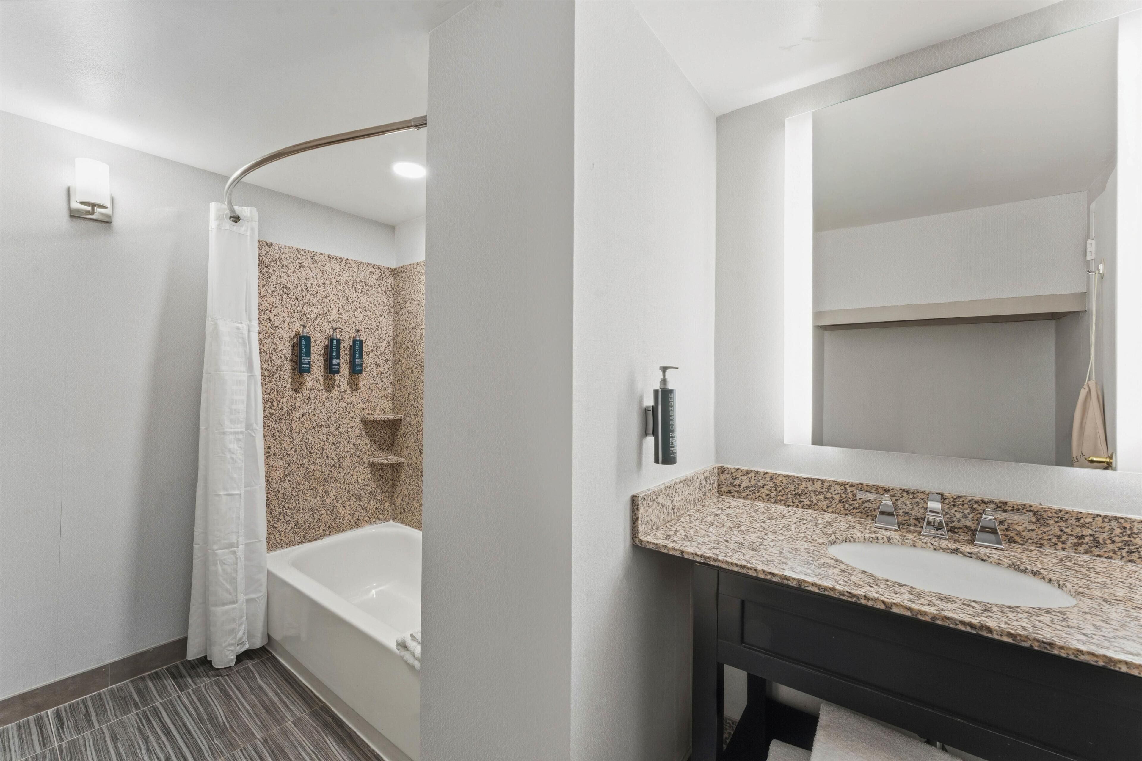 Premium Suite, 2 Double Beds, Non Smoking | Bathroom | Combined shower/bathtub, free toiletries, hair dryer, towels