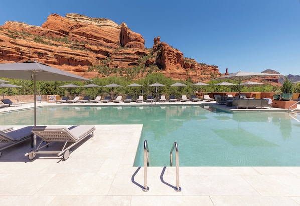 2 outdoor pools, pool umbrellas, pool loungers