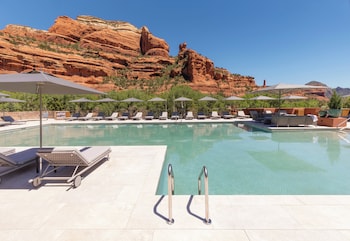 2 outdoor pools, pool umbrellas, sun loungers at Enchantment Resort