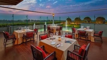 4 restaurants, breakfast, lunch, dinner served; Indian cuisine