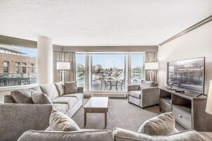 Suite, 1 Bedroom, Marina View | Living area | 50-inch Smart TV with cable channels, TV