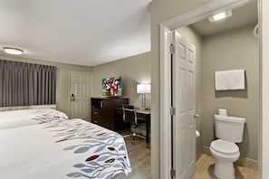 Deluxe Room (3 Queen Beds, Smoke Free) | Desk, blackout drapes, iron/ironing board, free cribs/infant beds