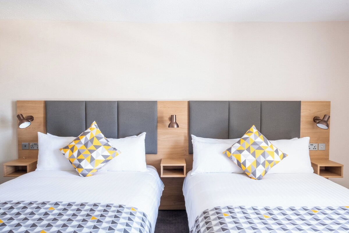 Hypo-allergenic bedding available, desk, laptop workspace