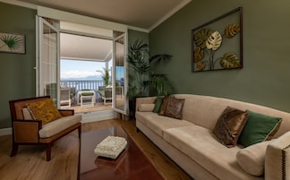 Grand Suite, Terrace, Sea View | Living room | 32-inch TV with satellite channels