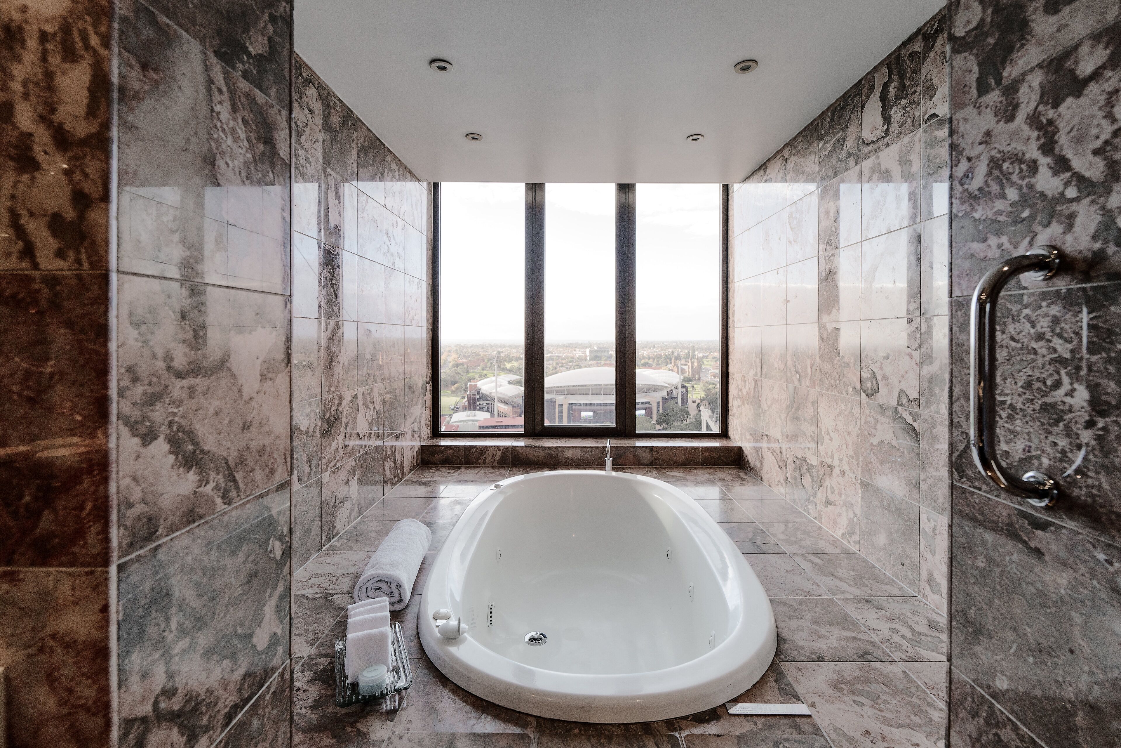 presidential suite, 1 king bed | bathroom | separate bathtub and shower, rainfall showerhead, designer toiletries